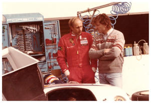 Rainer Wüst pictured here alongside driver Hans-Joachim Stuck. 
